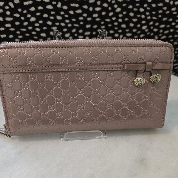 Gucci Handbags - Gucci Light Pink Metallic GG Wallet with Bow Charm Accents with Box